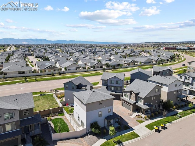 bird's eye view with a mountain view and a residential view