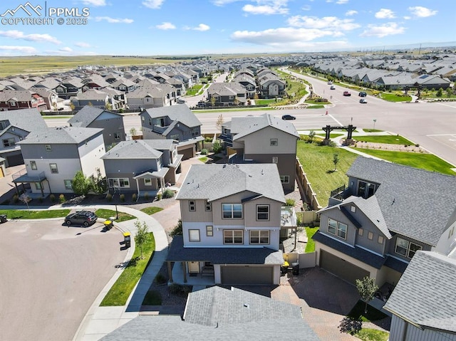 drone / aerial view with a residential view