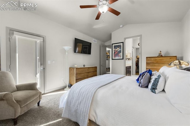 bedroom featuring baseboards, carpet floors, lofted ceiling, ceiling fan, and connected bathroom