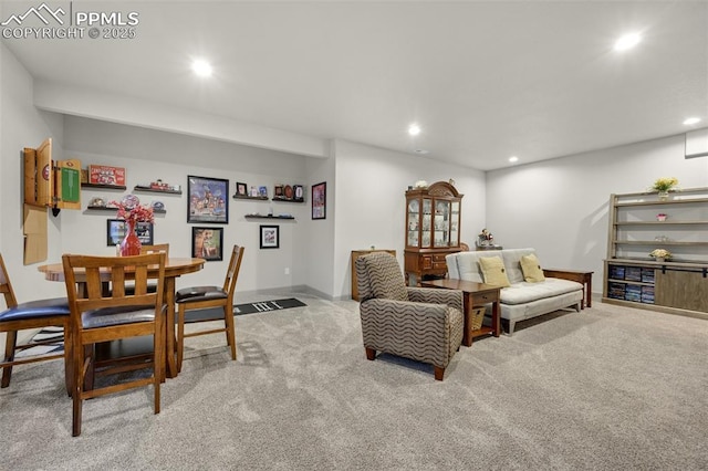 living room with recessed lighting and carpet flooring