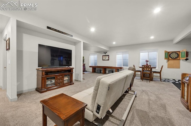 living room with recessed lighting, baseboards, and carpet flooring