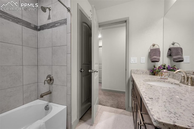 full bathroom with vanity, bathtub / shower combination, baseboards, and tile patterned flooring