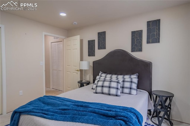 bedroom with carpet flooring and recessed lighting