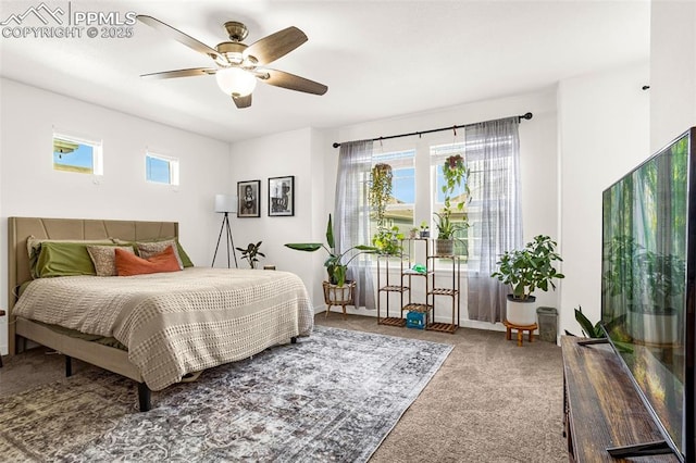 bedroom with carpet floors, ceiling fan, and baseboards