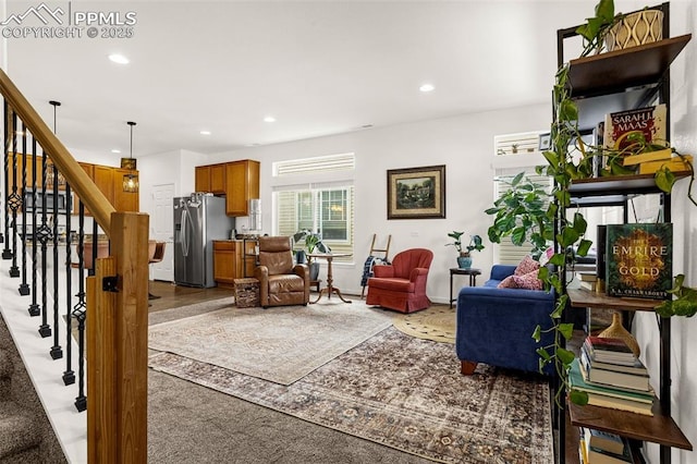 living room featuring stairs and recessed lighting