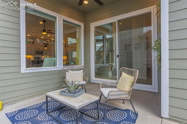 view of patio / terrace featuring ceiling fan