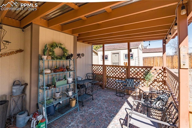 view of patio with fence