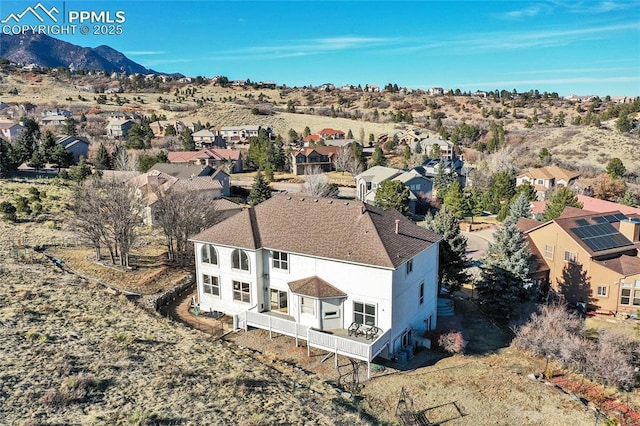 birds eye view of property featuring a residential view and a mountain view