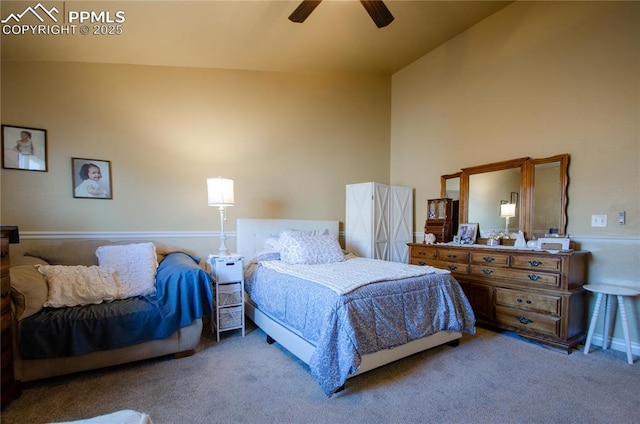 bedroom featuring ceiling fan and carpet flooring