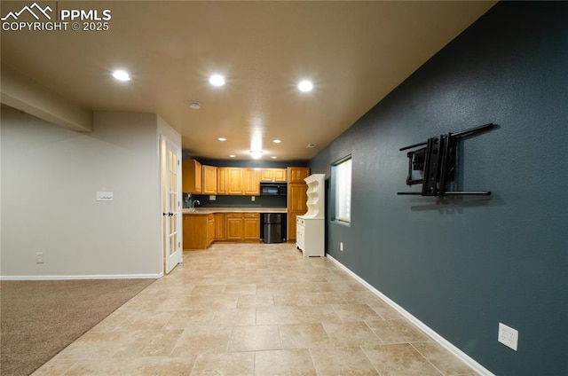 kitchen with black appliances, recessed lighting, light countertops, and baseboards