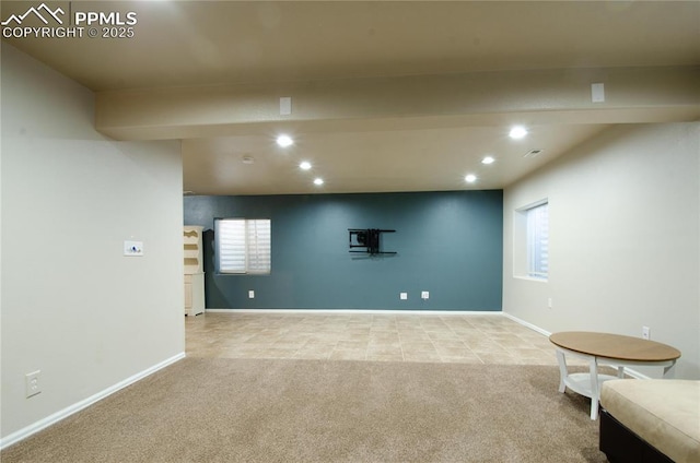 basement featuring recessed lighting, baseboards, and carpet floors