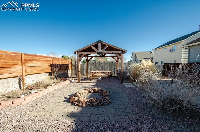 view of yard with a gazebo, a patio area, and a fenced backyard