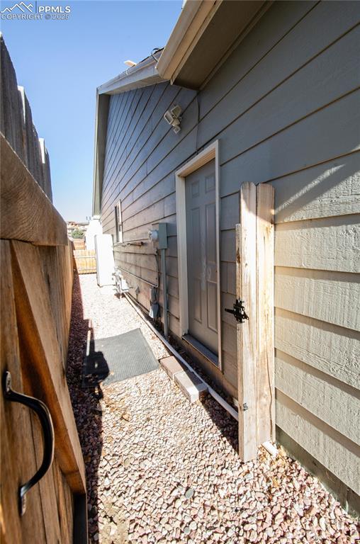 view of side of property with fence