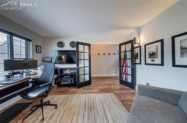 office featuring french doors and wood finished floors