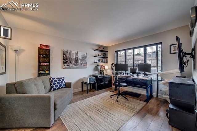 home office featuring baseboards and hardwood / wood-style floors