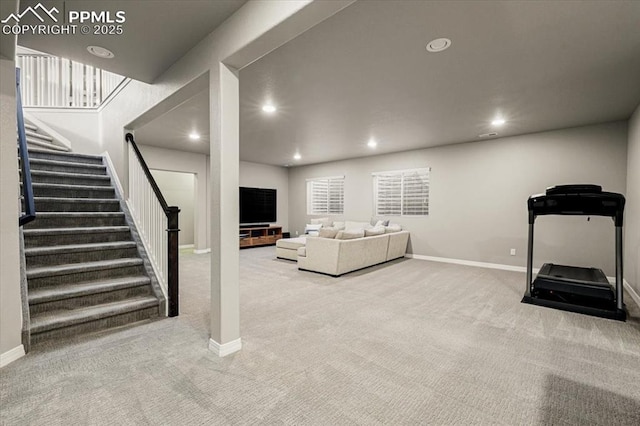 carpeted living room with stairs, recessed lighting, and baseboards