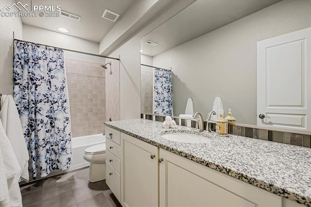 full bath with vanity, shower / bath combination with curtain, toilet, and visible vents