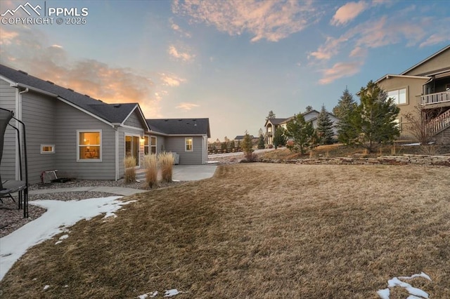 exterior space featuring a yard and a patio area