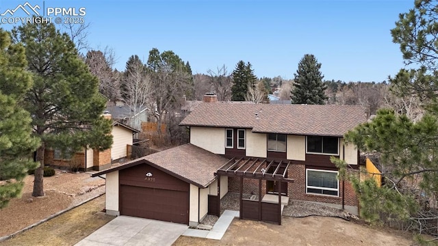 view of front of house with driveway and an attached garage