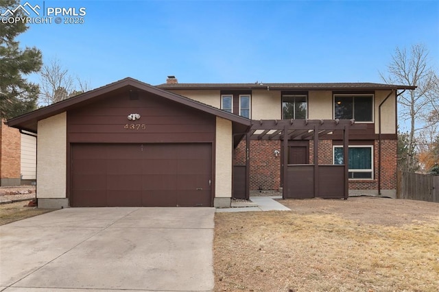 view of front facade with an attached garage, brick siding, fence, concrete driveway, and a pergola