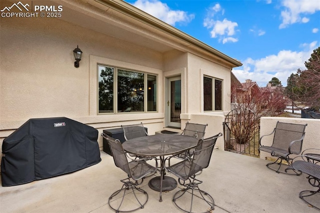 view of patio / terrace with outdoor dining area and grilling area