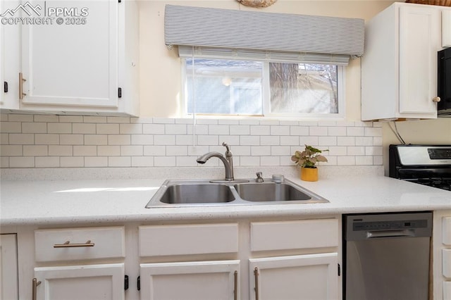 kitchen featuring a sink, dishwasher, decorative backsplash, white cabinetry, and range