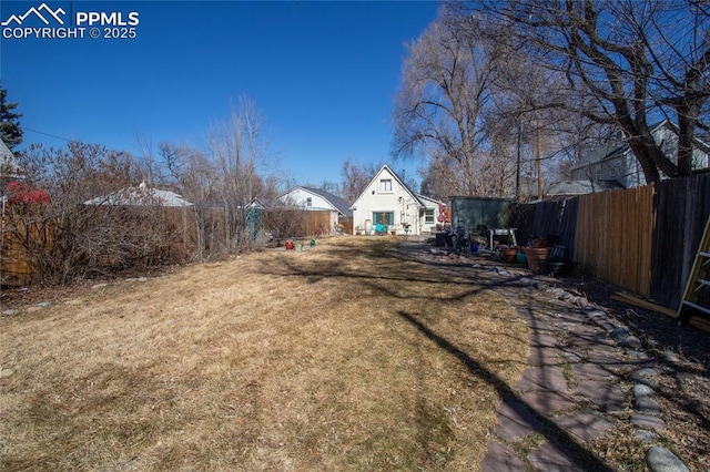 view of yard featuring a fenced backyard