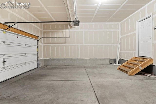 garage featuring a garage door opener