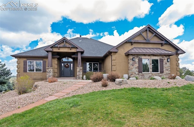 17820 Pioneer Xing, Colorado Springs, CO 80908 - craftsman-style house with stone siding, a front yard, stucco siding, and a standing seam roof