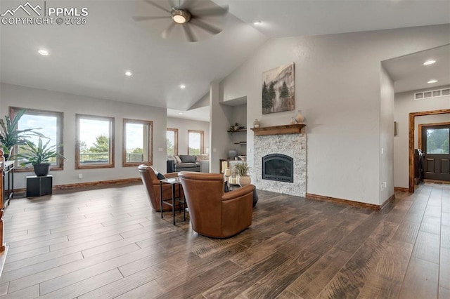 17820 Pioneer Xing, Colorado Springs, CO 80908 - living room with ceiling fan, dark wood finished floors, plenty of natural light, recessed lighting, and high vaulted ceiling