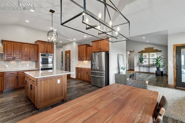 17820 Pioneer Xing, Colorado Springs, CO 80908 - kitchen with stainless steel appliances, recessed lighting, brown cabinets, dark wood-style floors, and high vaulted ceiling