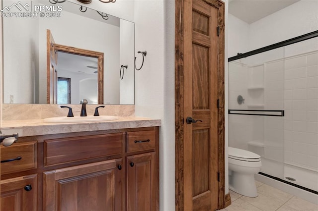 17820 Pioneer Xing, Colorado Springs, CO 80908 - full bathroom with toilet, a shower stall, vanity, and tile patterned flooring