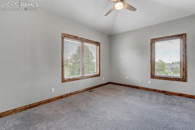17820 Pioneer Xing, Colorado Springs, CO 80908 - carpeted empty room with healthy amount of natural light, a ceiling fan, vaulted ceiling, and baseboards