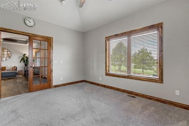 17820 Pioneer Xing, Colorado Springs, CO 80908 - unfurnished room featuring carpet floors, french doors, lofted ceiling, ceiling fan, and baseboards