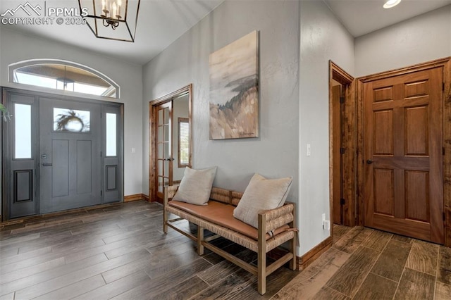 17820 Pioneer Xing, Colorado Springs, CO 80908 - foyer featuring dark wood-style flooring, healthy amount of natural light, a chandelier, baseboards, and recessed lighting