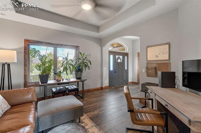 17820 Pioneer Xing, Colorado Springs, CO 80908 - living room with a ceiling fan, plenty of natural light, arched walkways, and baseboards