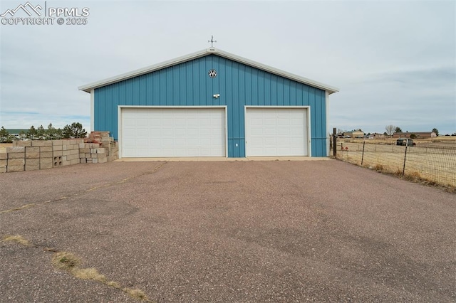 detached garage with fence