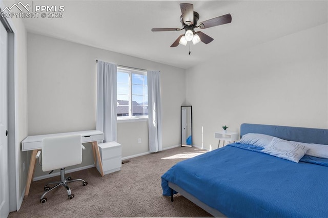 carpeted bedroom featuring a ceiling fan and baseboards