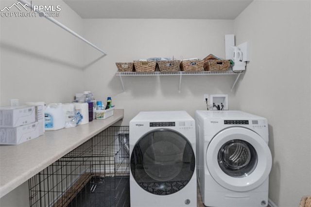 laundry area featuring laundry area and washer and dryer