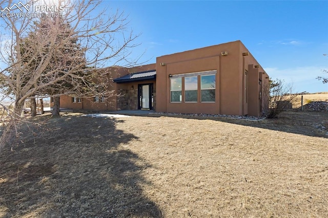 view of front of house with stucco siding