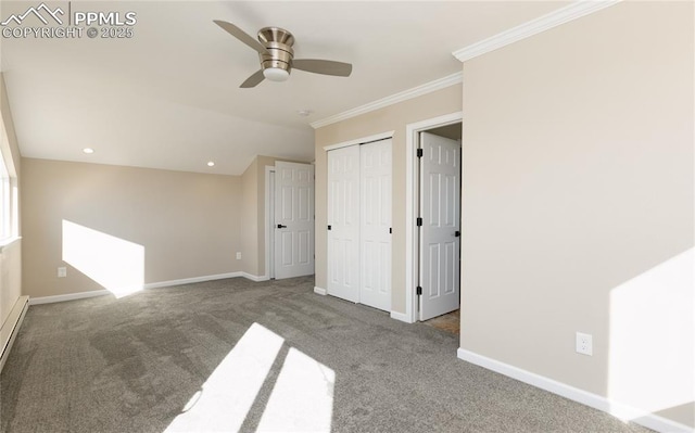 unfurnished bedroom with carpet flooring, a ceiling fan, baseboards, ornamental molding, and a closet