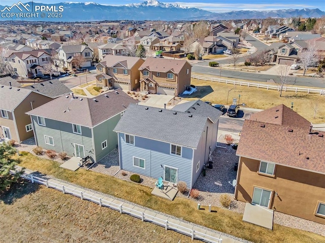 aerial view featuring a residential view and a mountain view