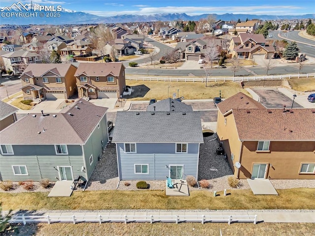 aerial view with a residential view and a mountain view