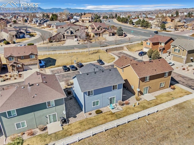 birds eye view of property featuring a residential view and a mountain view