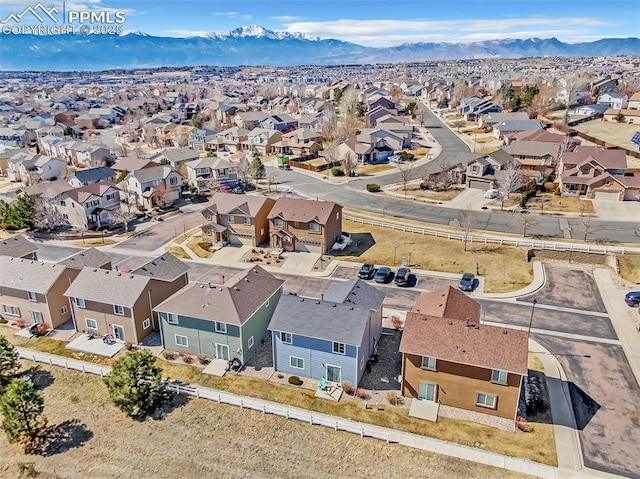 aerial view with a mountain view and a residential view