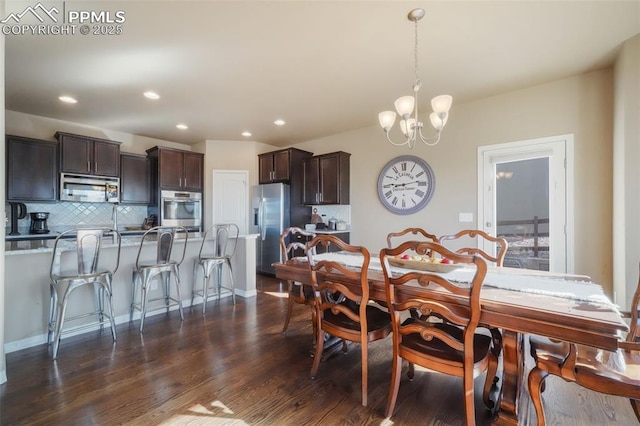 dining area featuring recessed lighting, a chandelier, and dark wood-style flooring