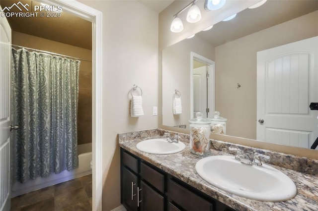 bathroom featuring double vanity, toilet, shower / bath combo, and a sink