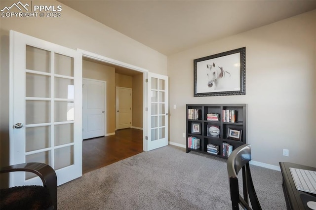 carpeted office space featuring french doors and baseboards