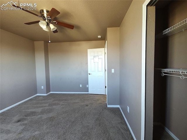 unfurnished bedroom with carpet floors, a closet, baseboards, and a textured ceiling