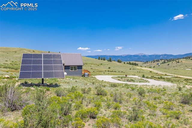 property view of mountains with a rural view